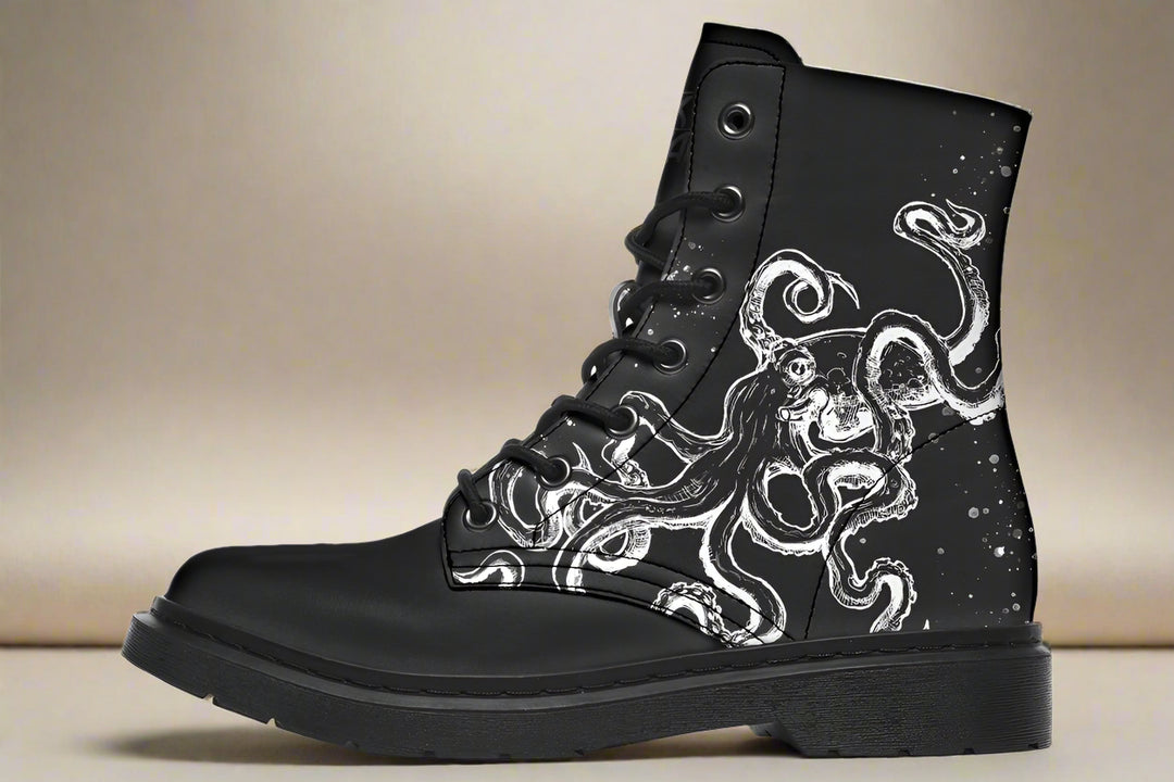 Alt Text: Outer left boot of Octopus Black Out Edition showing minimal graphic detail — allowing room for shadow and interpretation.Description:Black lace-up leather boots with tonal black octopus artwork — Octopus Black Out Edition by Sky Titan Media, crafted for stealth-driven streetwear with artistic depth and indie rebellion.This outer left panel tones down the tentacle form, letting the leather’s natural sheen become part of the art. Less ink, more suggestion — where shadow becomes narrative.