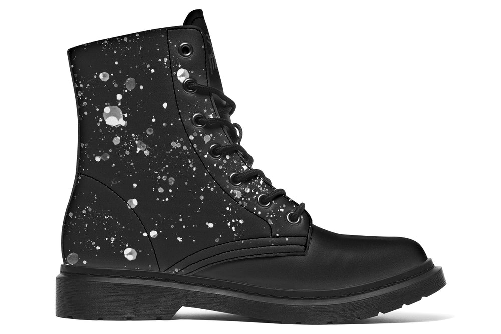 Black lace-up leather boots with tonal black octopus artwork — Octopus Black Out Edition by Sky Titan Media, crafted for stealth-driven streetwear with artistic depth and indie rebellion.A canvas of absence — almost. This side features mostly untouched black leather, but with faint splattered white ink that breaks the silence. 