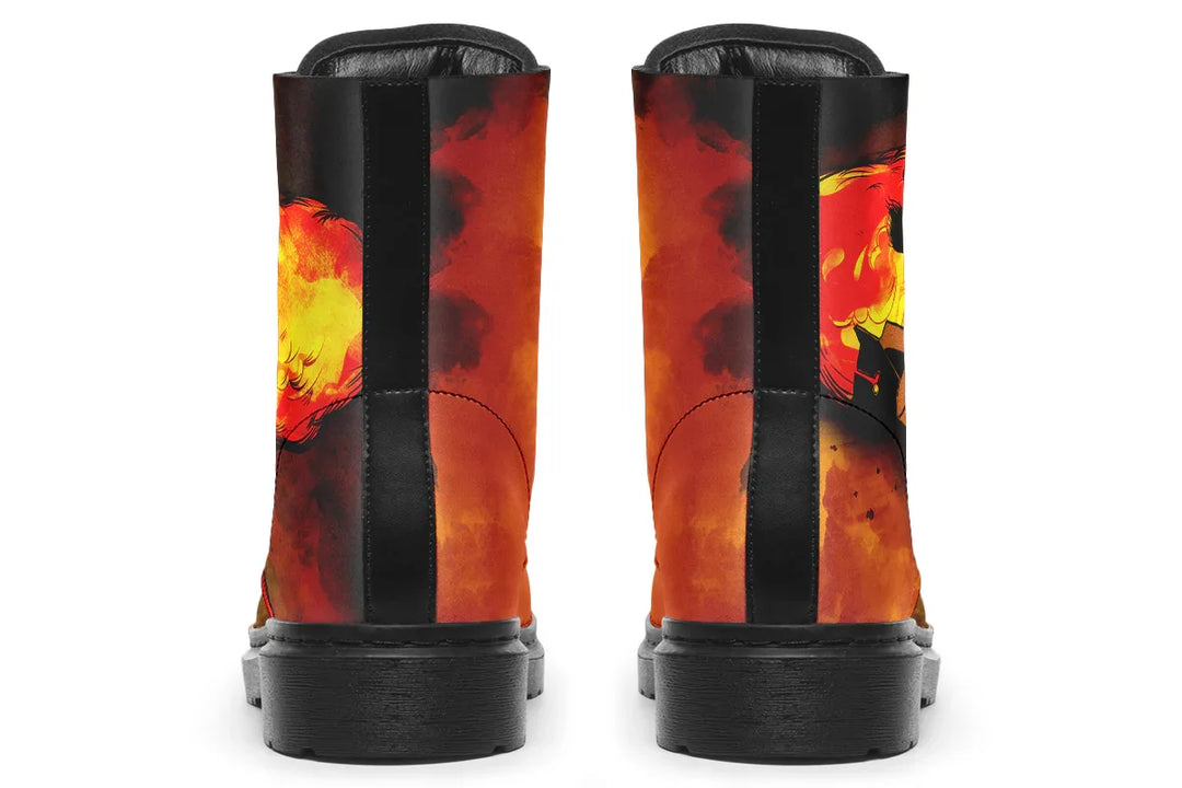 Black lace-up boots featuring reinforced black heel strips with vertical stitching and a fiery orange-red smoke pattern wrapping around the back. The Bomber Girl illustration is partially visible at the rear of the right boot, while the left remains clean. — Bomber Girl design by Sky Titan Media, combining vintage military-inspired art with edgy, music-fueled streetwear flair.