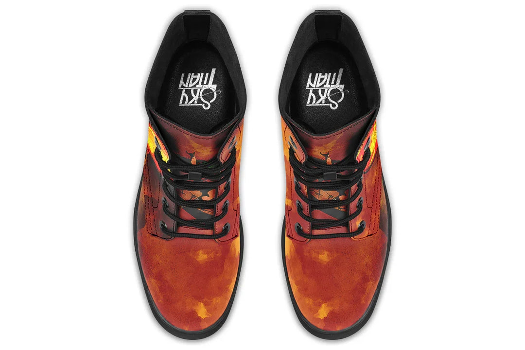 Black lace-up boots featuring a gradient smoke texture flowing from heel to toe in shades of deep orange and red. Black laces crisscross the vamp area, and Sky Titan branding is printed on the insole. No visible figure from this angle — just bold color and clean top-line construction. — Bomber Girl design by Sky Titan Media, combining vintage military-inspired art with edgy, music-fueled streetwear flair.