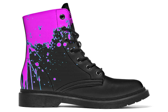 Black lace-up boots with striking pink neon cyber cat artwork on the sides – Cyber Cat Pink Edition by Sky Titan Media, blending fierce futuristic style with bold, music-driven streetwear attitude.
This right profile showcases the neon-pink upper, dramatically layered with black paint splashes and fine electric-blue drips. The cyberpunk design boldly frames the cat-inspired art, making this side a walking canvas of rebellion and rhythm.