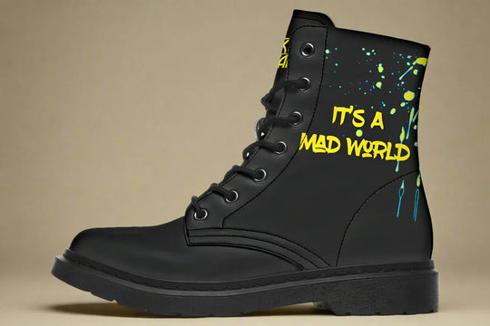 Black lace-up boots with electrifying yellow cyber cat artwork on the sides – Cyber Cat Yellow Edition by Sky Titan Media, fusing futuristic rebellion with bold, music-charged streetwear energy.
This right side makes a statement with a bold graffiti tag: “IT’S A MAD WORLD” blazes across the outer canvas in neon yellow, echoing chaos, resistance, and cyberpunk grit.