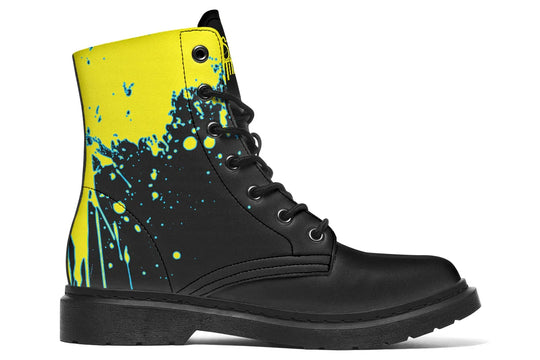 Black lace-up boots with electrifying yellow cyber cat artwork on the sides – Cyber Cat Yellow Edition by Sky Titan Media, fusing futuristic rebellion with bold, music-charged streetwear energy.
The inner side pulses with raw intensity—bold yellow paint splatters explode across the black canvas like soundwaves breaking through silence.