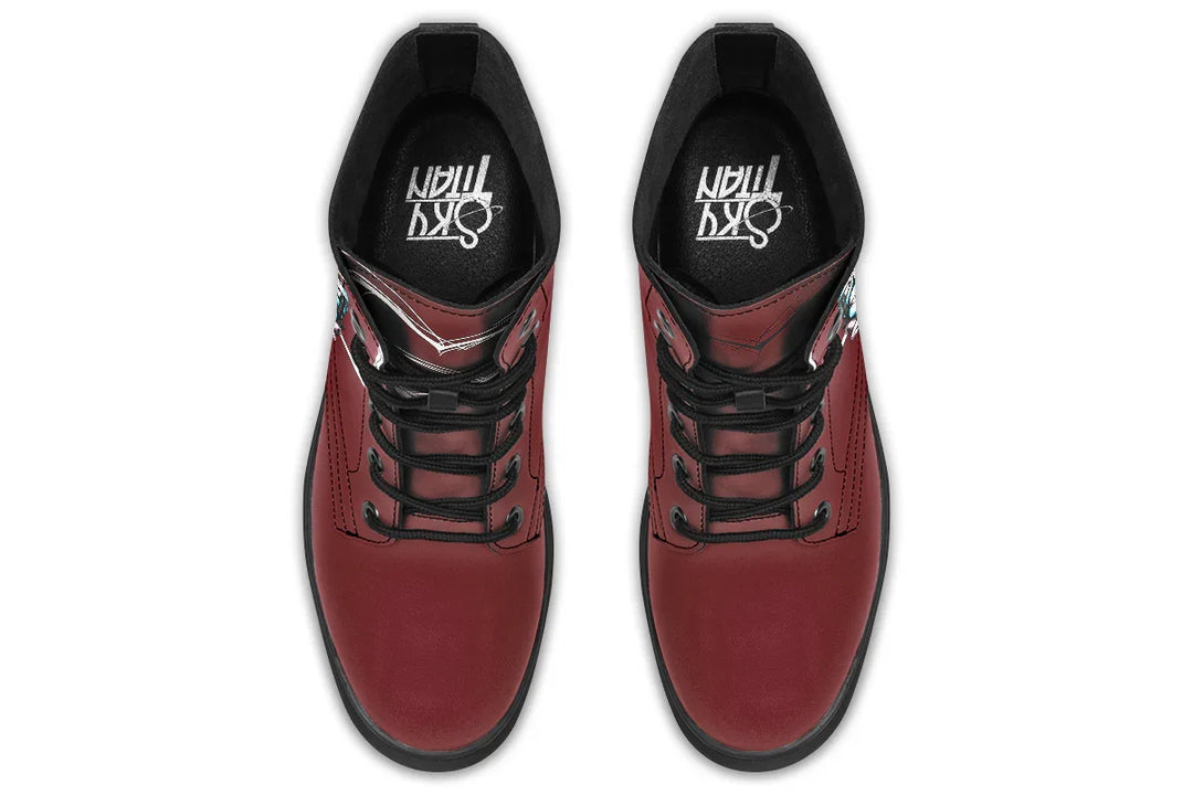 Red lace-up leather boots showcasing expressive line art of two reaching hands from the “July” single cover –  July Edition by Sky Titan Media, blending raw emotional symbolism with bold, music-driven streetwear design.From above, the structured lace system and deep red leather form a clean yet passionate composition. The Sky Titan logo rests inside—minimal, intentional.