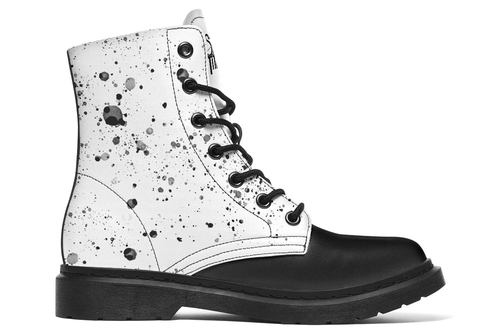 White leather lace-up boot with black octopus ink splatter — Octopus Mismatched Edition by Sky Titan Media, designed for asymmetry, negative space, and tension.This side remains absent of tentacles — instead, scattered black splatters mark the leather like the aftermath of motion. 