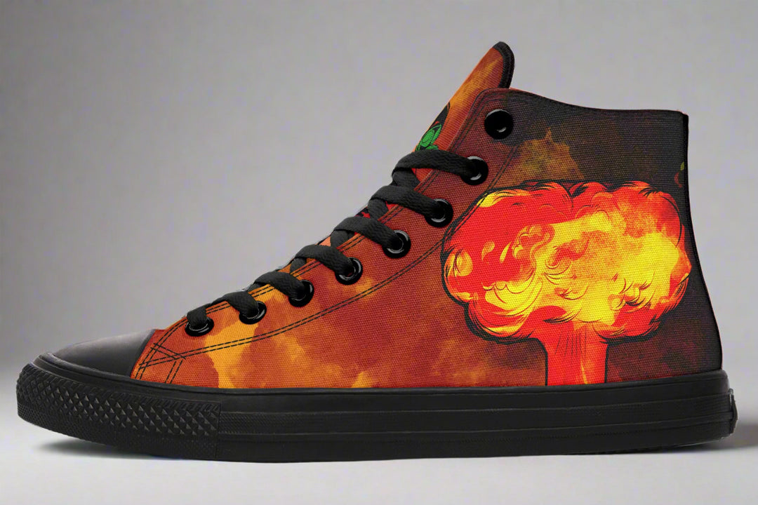 Black high-top canvas sneaker featuring an explosive red-orange smoke blast across the outer side. The graphic texture adds dynamic energy and contrast, set against black canvas and finished with a black rubber midsole and black toe cap. — Bomber Girl design by Sky Titan Media, combining vintage military-inspired art with edgy, music-fueled streetwear flair.