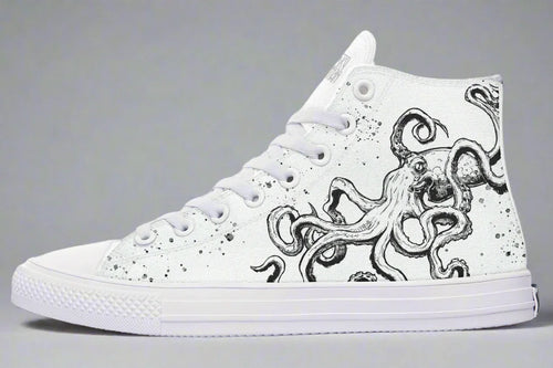 Side profile of the all-white Octopus White Out Edition sneaker, with black octopus line art winding across pure white canvas. White outsole, eyelets, and toe box emphasize the shoe’s refined, modernist minimalism—elevating the artwork into a high-concept statement for streetwear purists.