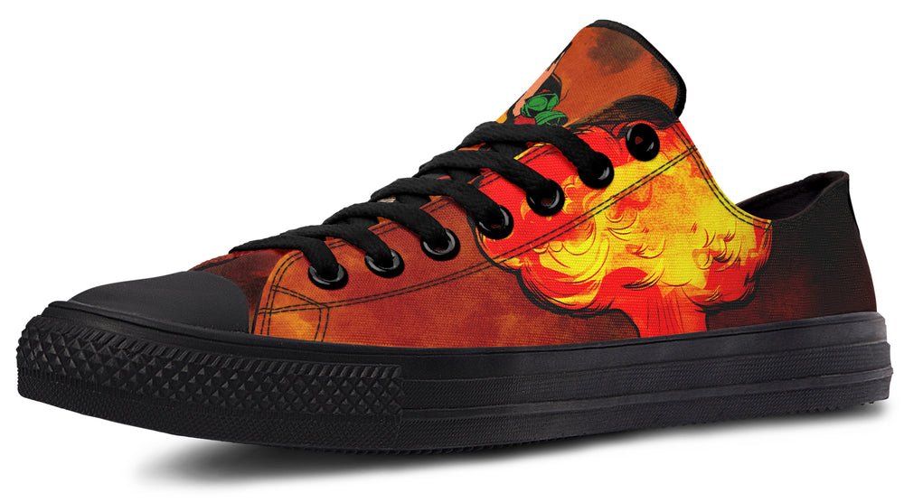 Complementary Black low-top sneaker displaying a more abstract, fiery smoke design in red and orange tones. This balances the boldness of the right shoe by shifting the focus to atmospheric detail — making the Bomber Girl side stand out even more. Matte black sole, toe cap, and laces keep the look sharp.