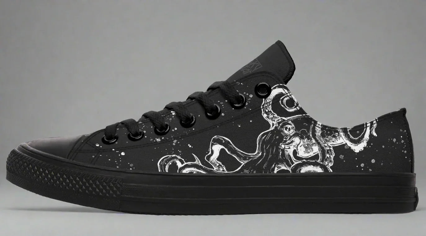 Black low-top sneakers with tonal white octopus artwork  – Octopus Blackout by Sky Titan Media, blending stealthy style with indie streetwear and deep-sea-inspired creativity.