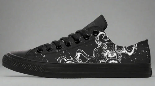 Black low-top sneakers with tonal white octopus artwork  – Octopus Blackout by Sky Titan Media, blending stealthy style with indie streetwear and deep-sea-inspired creativity.