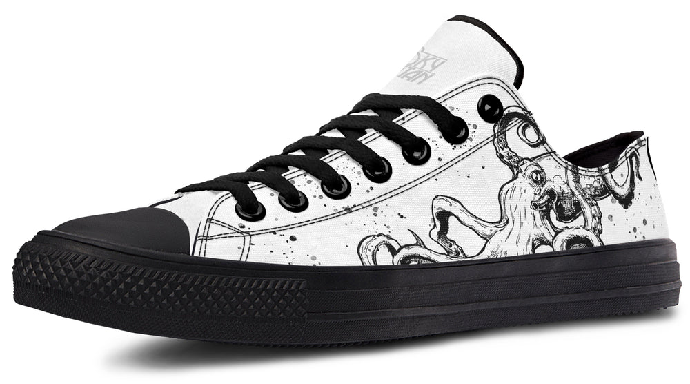 Mismatched low-top sneakers featuring black and white octopus illustrations on each shoe – Octopus Mismatched design by Sky Titan Media, celebrating creativity, contrast, and independent streetwear style.