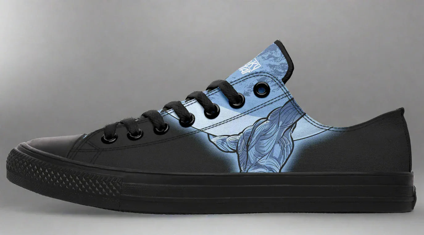 Black low-top sneakers featuring blue-toned artwork of Atlas holding up the sky – Skybound design by Sky Titan Media, blending mythology-inspired visuals with streetwear rooted in independent music culture.