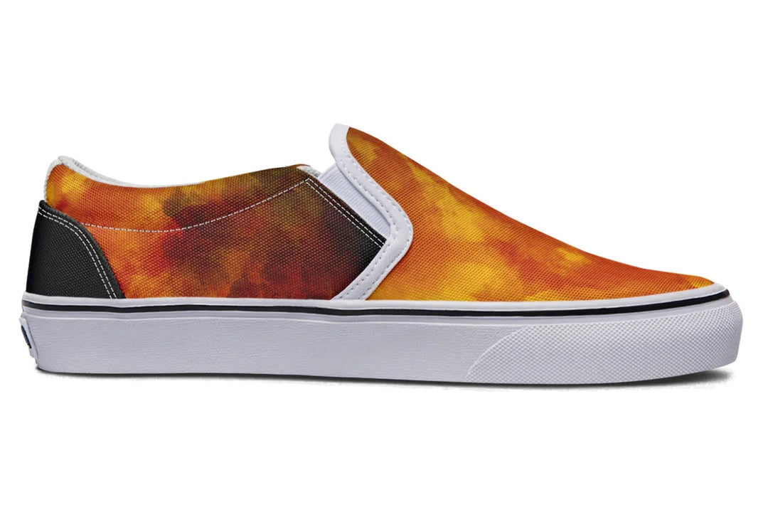 Black slip-on sneaker featuring vibrant red-orange smoke artwork across the inner side of the shoe, framed by clean white binding and contrasted by a white quarter panel. No illustration appears on this side, allowing the textured canvas to shine. — Bomber Girl design by Sky Titan Media, merging vintage attitude with edgy, music-fueled streetwear style.