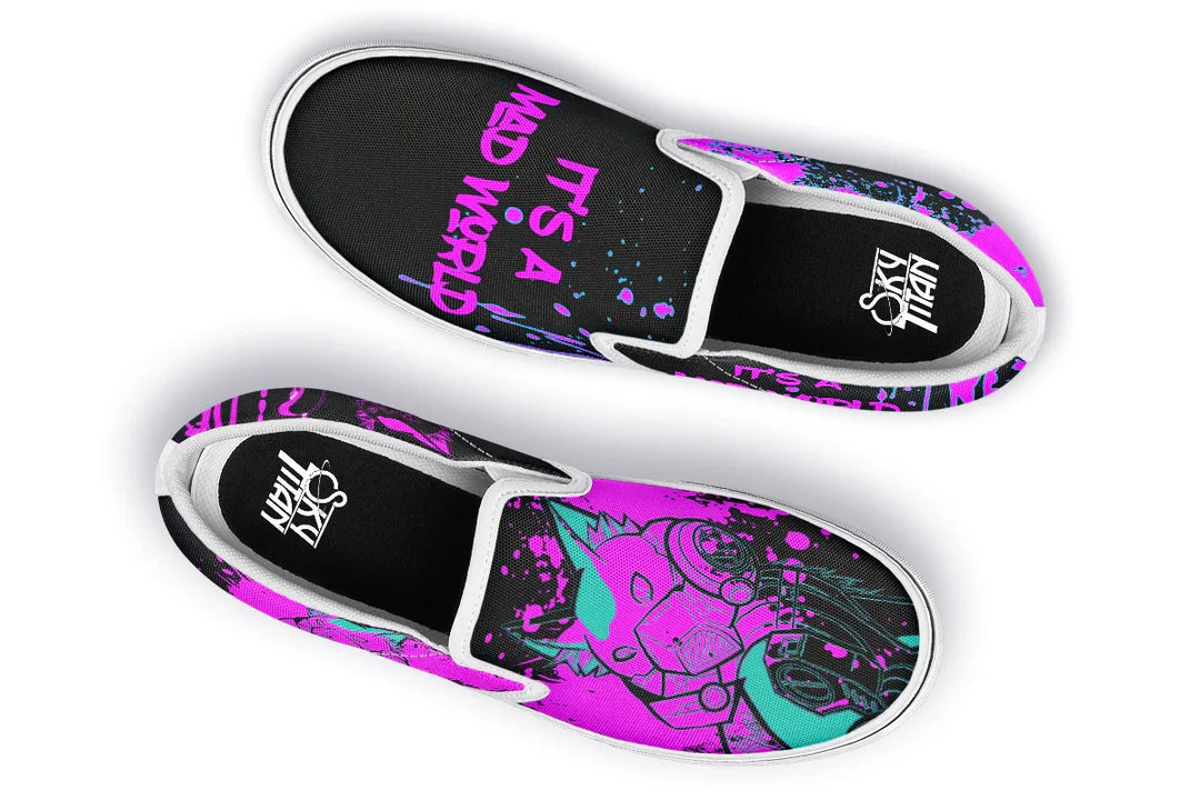Black slip-on sneakers featuring asymmetrical cyber cat punk artwork and graffiti statements with white detailing — the Cyber Cat Pink Edition by Sky Titan Media, fusing futuristic street rebellion with bold, music-charged expression.
From above, crisp white elastic panels and toe caps punctuate the design: left shoe reads “It’s A Mad World” in graffiti font, while the right hosts a neon pink cyber cat head. Clean contrast elevates every line and brushstroke.