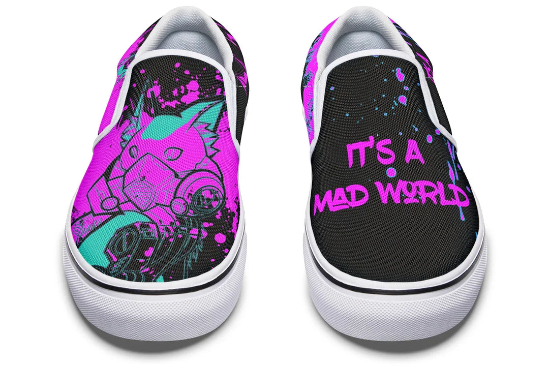 Black slip-on sneakers featuring asymmetrical cyber cat punk artwork and graffiti statements with white detailing — the Cyber Cat Pink Edition by Sky Titan Media, fusing futuristic street rebellion with bold, music-charged expression.
Head-on, each shoe declares its own message—graffiti protest on the left, feline techno-symbolism on the right. White toe caps give the design a clean edge and visual punch.