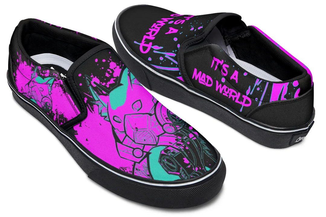 Black slip-on sneakers featuring asymmetrical cyber cat punk artwork and graffiti statements — the Cyber Cat Pink Edition by Sky Titan Media, fusing futuristic street rebellion with bold, music-charged expression.
This top-down view captures the contrasting visuals: the left shoe bears “It’s A Mad World” in graffiti-style pink lettering, while the right features the Cyber Cat Punk head in vibrant neon pink. A split design that commands attention from every angle.