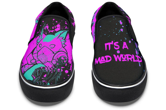 Black slip-on sneakers featuring asymmetrical cyber cat punk artwork and graffiti statements — the Cyber Cat Pink Edition by Sky Titan Media, fusing futuristic street rebellion with bold, music-charged expression.
From the front, the shoes speak two languages: punk graffiti on the left, anime-futuristic feline on the right. This split-graphic approach turns each foot into a visual statement.