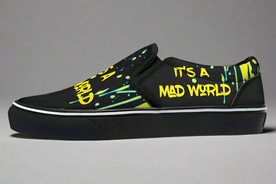 “IT’S A MAD WORLD” stretches across the left shoe’s outer panel in neon graffiti script, backed by electric yellow splatters that echo urban energy and punk attitude. This side screams rebellion. These black slip-on sneakers feature neon yellow cyber cat graphics, graffiti slogans. — Cyber Cat Yellow Edition by Sky Titan Media, built for rebels with futuristic flair and music-fueled streetwear energy.
