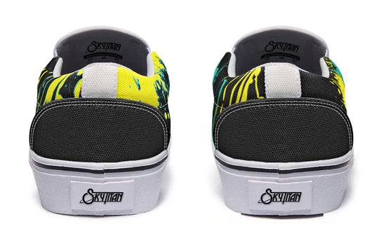 The heels feature dripping yellow splatter effects, like graffiti tags caught in motion. Back pull tabs are subtle, letting the chaos do the talking. White soles rise slightly to emphasize contrast. These black slip-on sneakers feature neon yellow cyber cat graphics and graffiti slogans — Cyber Cat Yellow Edition by Sky Titan Media, built for rebels with futuristic flair and music-fueled streetwear energy.