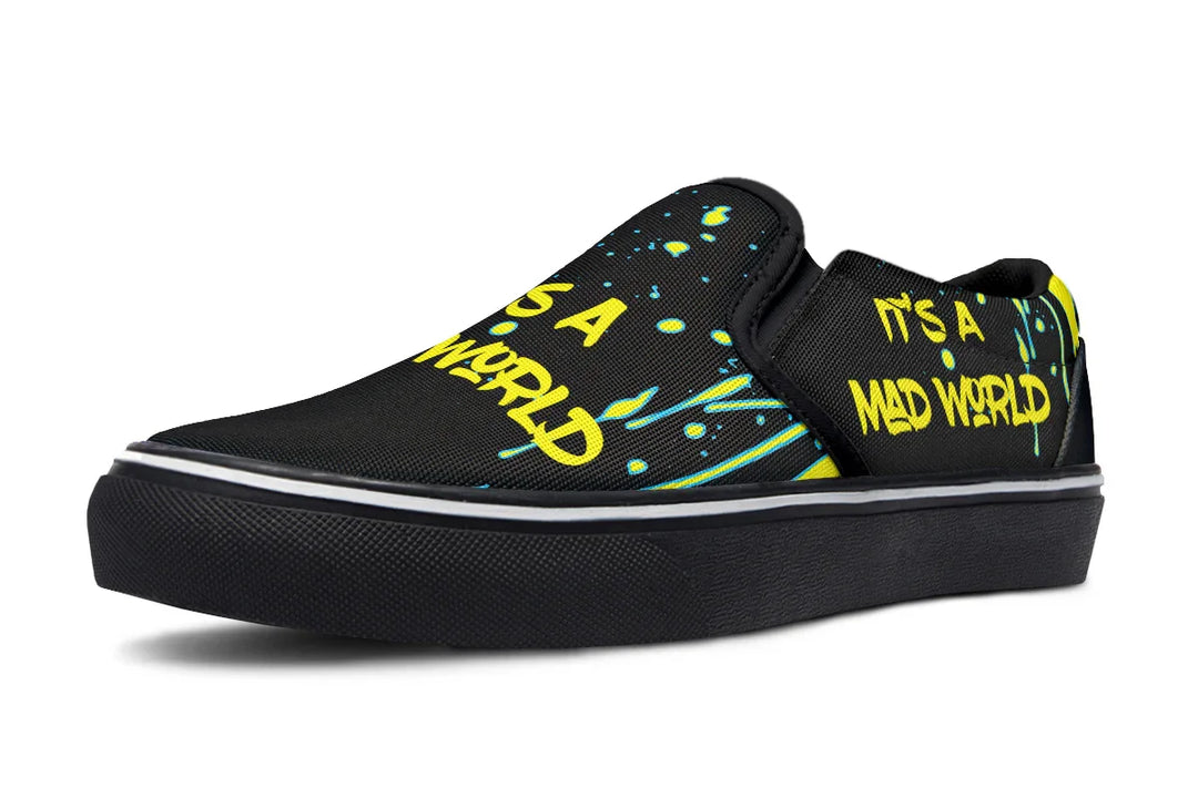 “IT’S A MAD WORLD” stretches across the left shoe’s outer panel in neon graffiti script, backed by electric yellow splatters that echo urban energy and punk attitude. This side screams rebellion. These black slip-on sneakers feature neon yellow cyber cat graphics, graffiti slogans. — Cyber Cat Yellow Edition by Sky Titan Media, built for rebels with futuristic flair and music-fueled streetwear energy.
