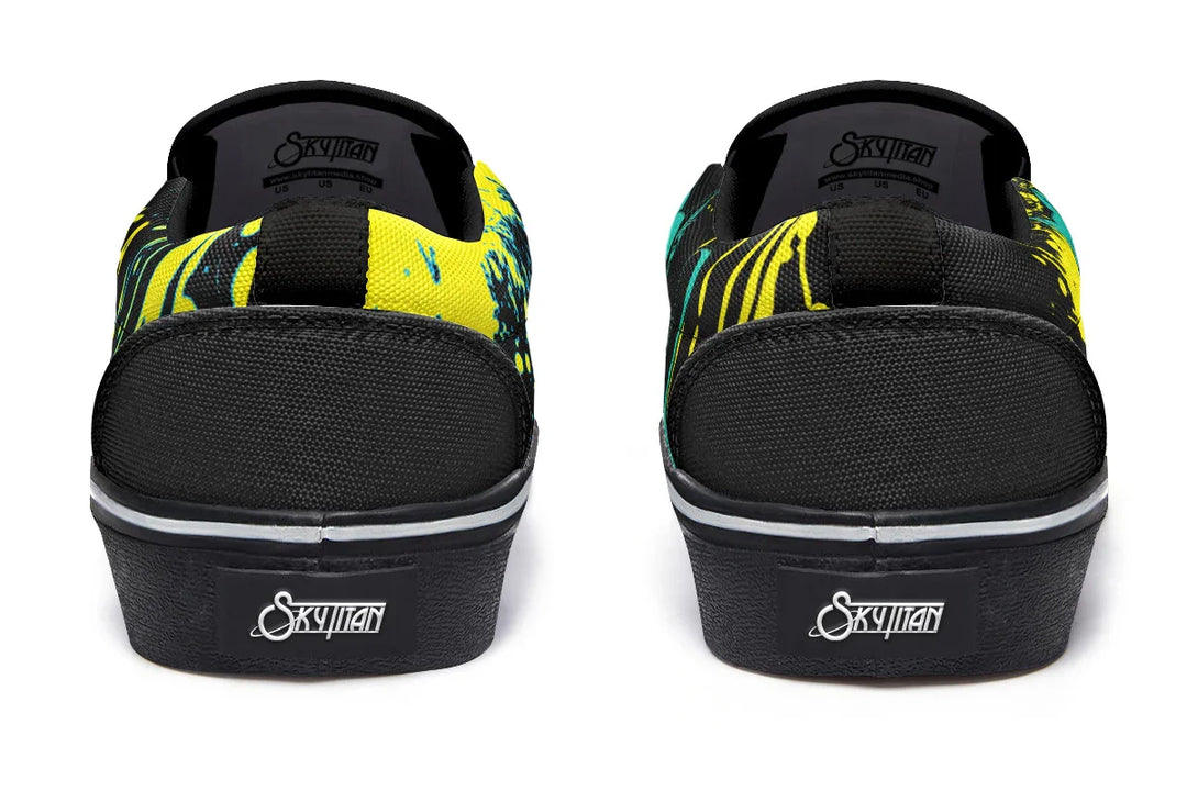 The heels feature dripping yellow splatter effects, like graffiti tags caught in motion. Back pull tabs are subtle, letting the chaos do the talking. These black slip-on sneakers feature neon yellow cyber cat graphics and graffiti slogans — Cyber Cat Yellow Edition by Sky Titan Media, built for rebels with futuristic flair and music-fueled streetwear energy.