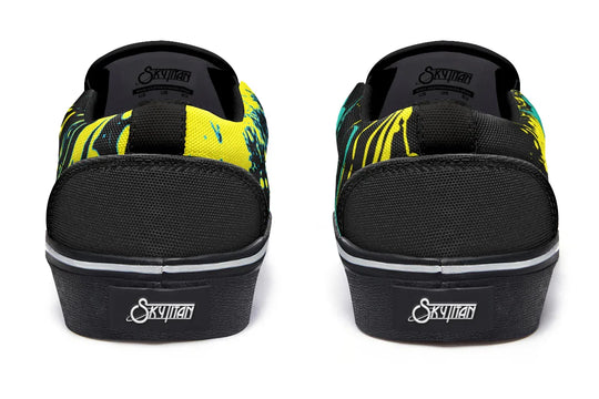 The heels feature dripping yellow splatter effects, like graffiti tags caught in motion. Back pull tabs are subtle, letting the chaos do the talking. These black slip-on sneakers feature neon yellow cyber cat graphics and graffiti slogans — Cyber Cat Yellow Edition by Sky Titan Media, built for rebels with futuristic flair and music-fueled streetwear energy.