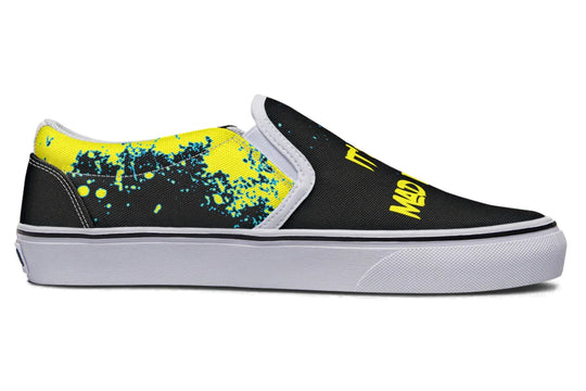 Yellow splatters spill across the inner side, wild and free — no icons, just pure motion and rebellious expression. Bright white sole and stitching offer contrast against the madness. These black slip-on sneakers feature neon yellow cyber cat graphics and graffiti slogans — Cyber Cat Yellow Edition by Sky Titan Media, built for rebels with futuristic flair and music-fueled streetwear energy.
