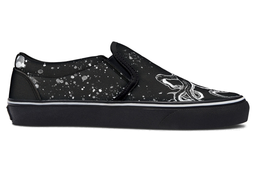 Side view of the Octopus Black Out Edition slip-on sneaker, designed by Sky Titan Media. The inky black canvas is layered with subtle white splatter effects and winding tentacle artwork near the toe. 