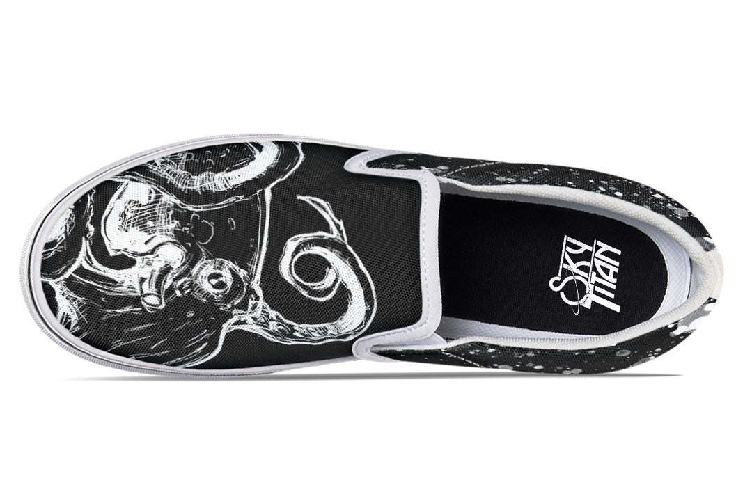 Top-down view of the Octopus Dual Canvas Edition sneakers with white soles, showcasing mirrored black-and-white octopus graphics and unified minimalism through contrasting uppers and clean base tones.