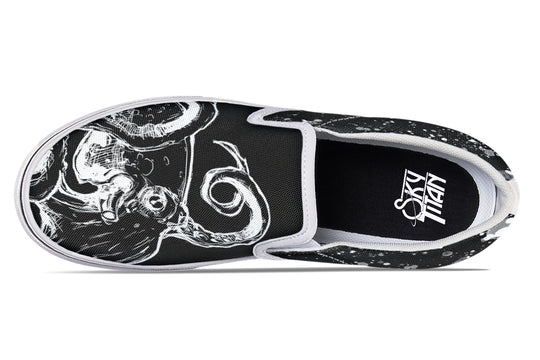 Top-down view of the Octopus Dual Canvas Edition sneakers with white soles, showcasing mirrored black-and-white octopus graphics and unified minimalism through contrasting uppers and clean base tones.
