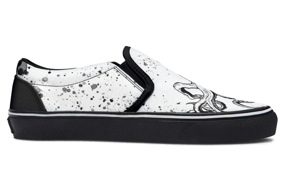 Side view of Sky Titan Media’s Octopus Dual Canvas Edition slip-ons – left shoe in white canvas with black octopus design, right shoe in black canvas with white octopus art, both unified by black soles and creative energy.