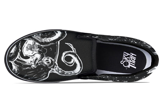 Top-down look at mismatched Octopus Dual Canvas Edition sneakers, highlighting mirrored black-and-white octopus graphics and splatter detailing for a split-yet-balanced artistic statement.