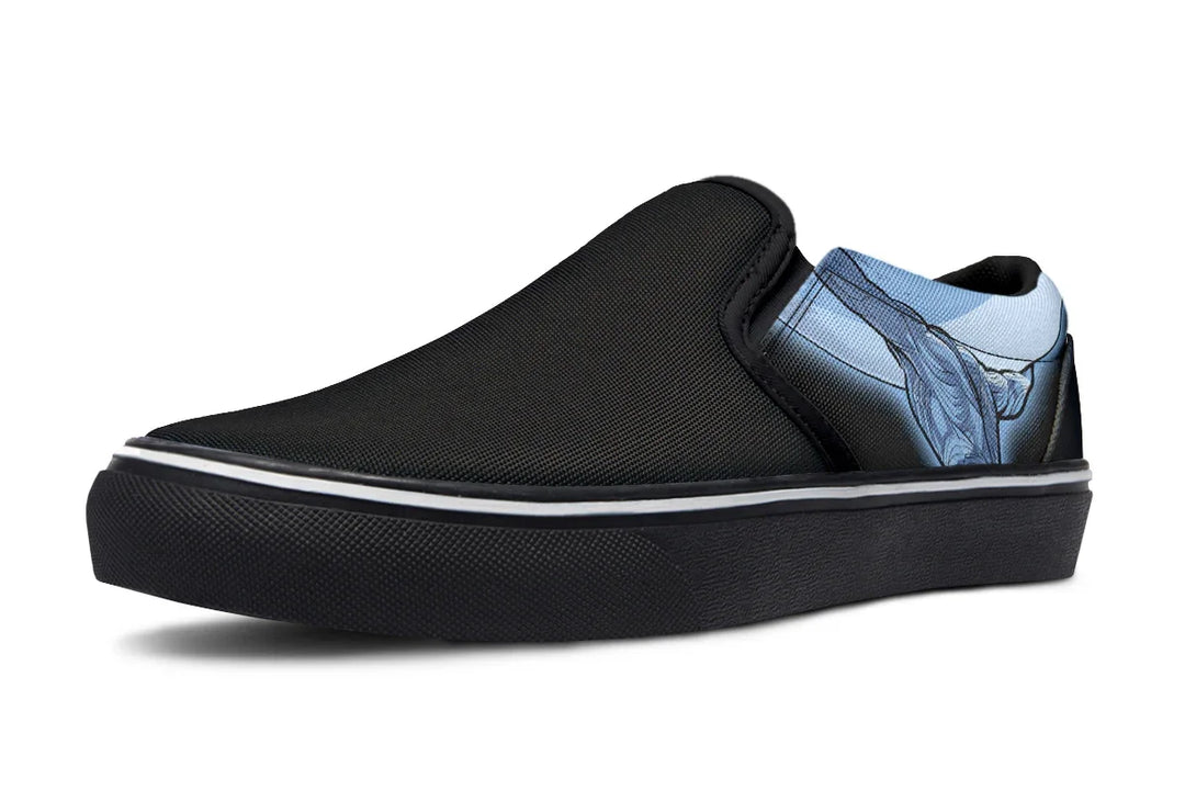 Black slip-on sneaker featuring a comic-style illustration of Atlas in blue tones, shown lifting the sky with strength and symbolism. The artwork covers the outer canvas, pairing mythic struggle with modern edge. — Skybound design by Sky Titan Media, blending mythology-inspired visuals with streetwear rooted in independent music culture.