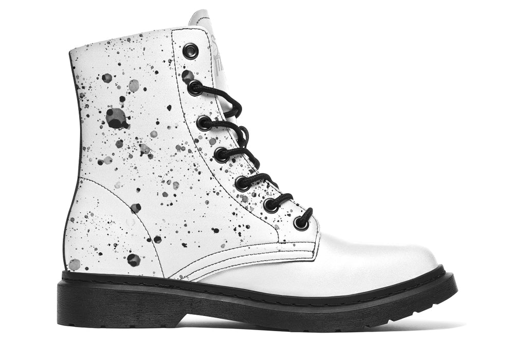 White leather lace-up boots with black octopus ink artwork — Octopus White Out Edition by Sky Titan Media, designed for pristine rebellion, visual clarity, and indie-edge storytelling.Mostly untouched white leather, but look closely: scattered black ink droplets linger here — like remnants of a past motion, or thought left behind. 